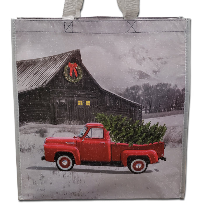 Bolsa de compras navideña con forma de camión rojo